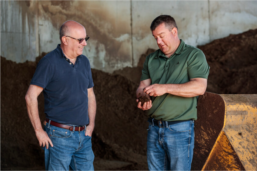 Regenis technician consulting with a farmer
